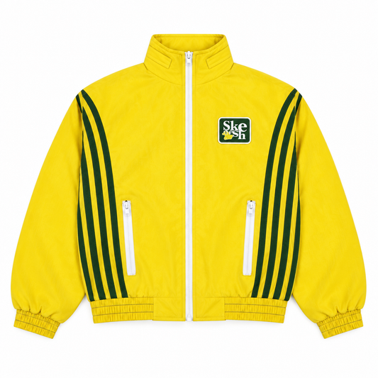 Skids V2 TrackJacket in yellow with green stripes, flat lay on white