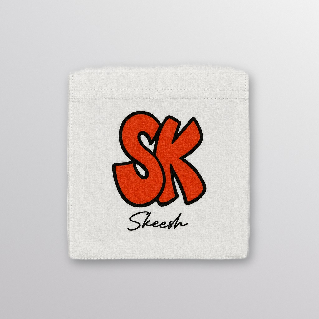 SK Vape Pocket Tee pocket detail, orange SK logo with script Skeesh