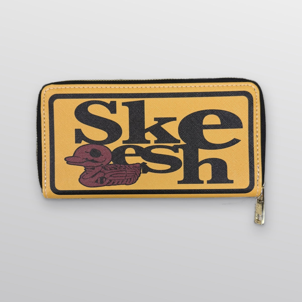 Skeesh Halloween Wallet in yellow with skeleton duck logo, front view